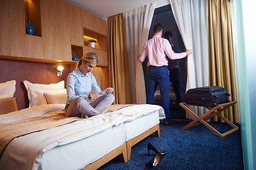 Image showing young couple in modern hotel room