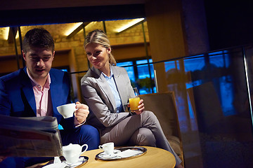 Image showing business couple take drink after work