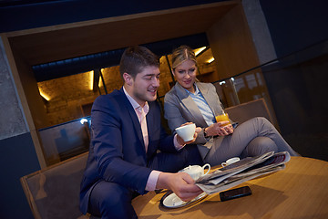 Image showing business couple take drink after work