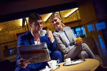 Image showing business couple take drink after work