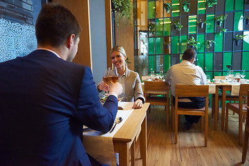 Image showing business couple having dinner