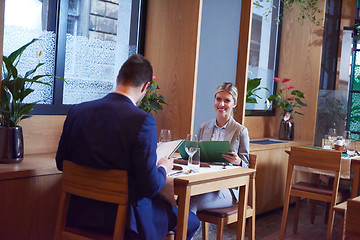 Image showing business couple having dinner