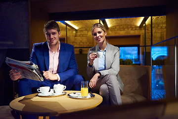 Image showing business couple take drink after work