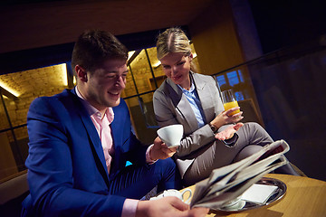 Image showing business couple take drink after work