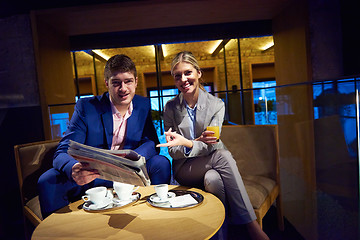 Image showing business couple take drink after work