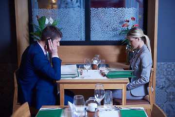 Image showing business couple having dinner