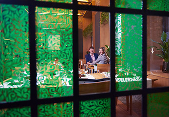 Image showing business couple having dinner