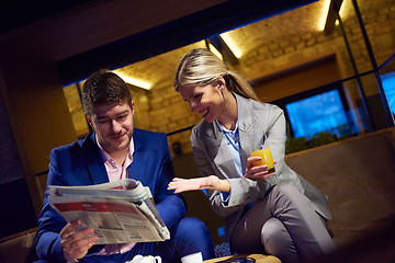 Image showing business couple take drink after work