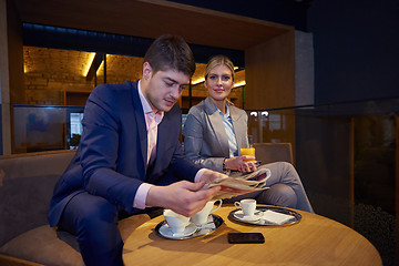 Image showing business couple take drink after work