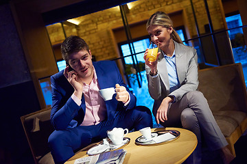 Image showing business couple take drink after work