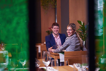 Image showing business couple having dinner