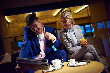 Image showing business couple take drink after work