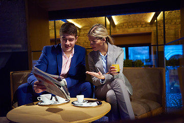 Image showing business couple take drink after work