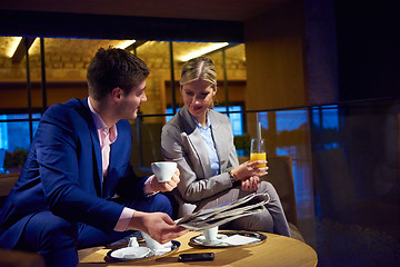 Image showing business couple take drink after work