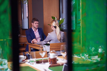 Image showing business couple having dinner
