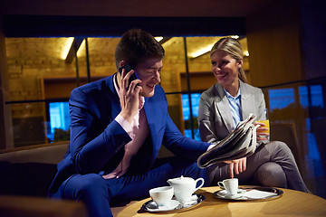 Image showing business couple take drink after work