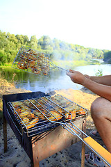 Image showing barbecue from hen's meat cooking in the nature