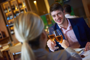 Image showing business couple having dinner