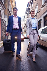 Image showing business people couple entering  hotel