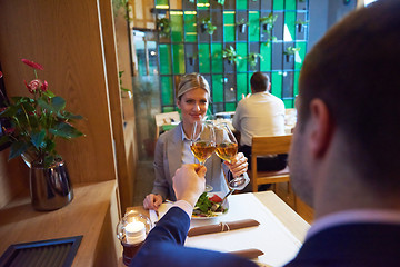 Image showing business couple having dinner