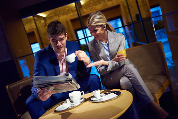 Image showing business couple take drink after work