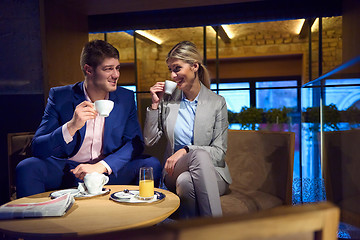 Image showing business couple take drink after work