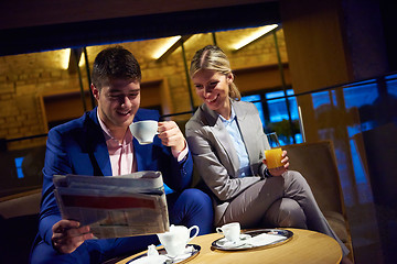 Image showing business couple take drink after work