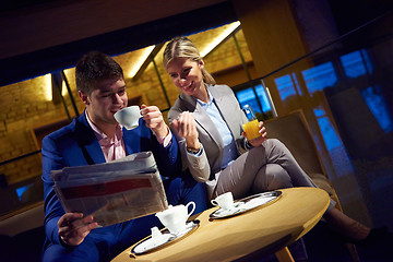 Image showing business couple take drink after work