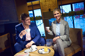 Image showing business couple take drink after work