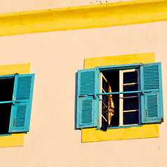 Image showing blue window in morocco africa old construction and brown wall  c