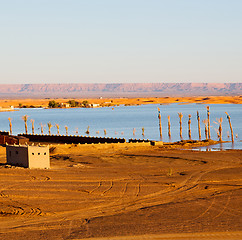 Image showing sunshine in the lake yellow  desert of morocco sand and     dune