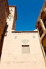 Image showing blue window in  and brown construction