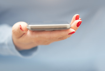 Image showing Woman with smartphone