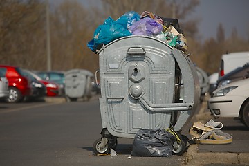 Image showing Garbage Containers Full, Overflowing