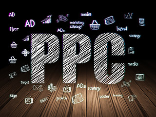 Image showing Advertising concept: PPC in grunge dark room