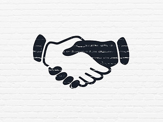 Image showing Business concept: Handshake on wall background