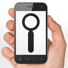 Image showing Data concept: Hand Holding Smartphone with Search on display