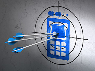 Image showing Currency concept: arrows in ATM Machine target on wall background