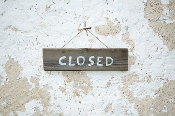 Image showing Closed at an old wooden sign