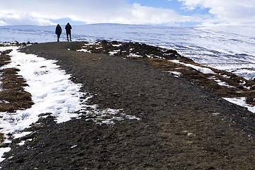 Image showing Tourists at the Icelandic waterfall Godafoss in wintertime