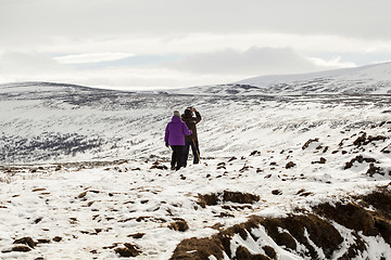 Image showing Hikers in wintry mountain landscape