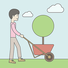 Image showing Man pushing cart.