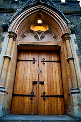 Image showing wooden parliament in london   and marble antique  wall