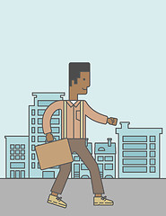 Image showing Businessman walking with briefcase. 