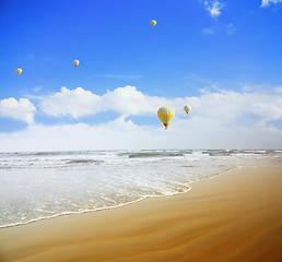 Image showing Air balloons over the sea