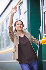 Image showing beautiful middle-aged woman returned from a retro travel