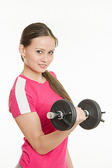 Image showing Beautiful athlete dumbbell in right hand