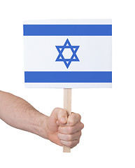 Image showing Hand holding small card - Flag of Israel