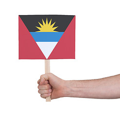 Image showing Hand holding small card - Flag of Antigua and Barbuda