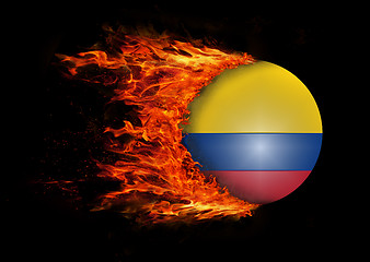 Image showing Flag with a trail of fire - Colombia